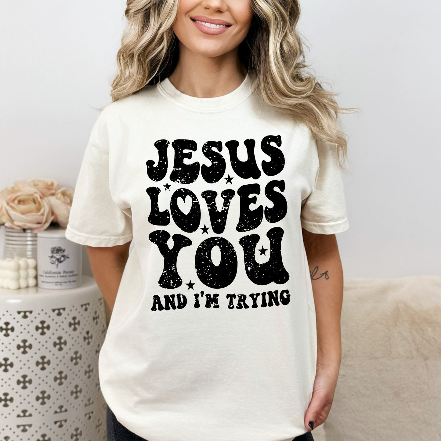 Jesus loves you and I'm trying tee